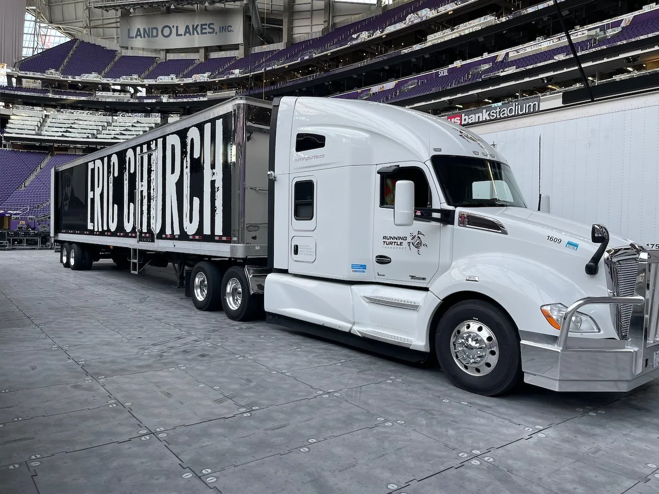 Running Turtle tractor and tour trailer inside a concert stadium